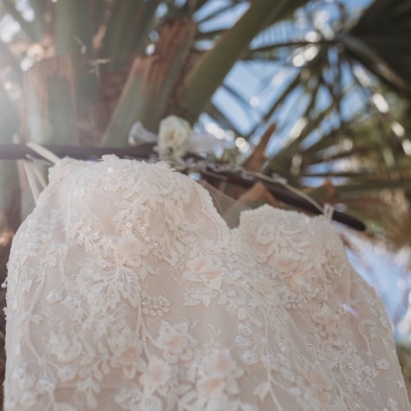 A-line, ivory lace bridal gown with blush flower detailing. size 10🤍 - Picture 9 of 10